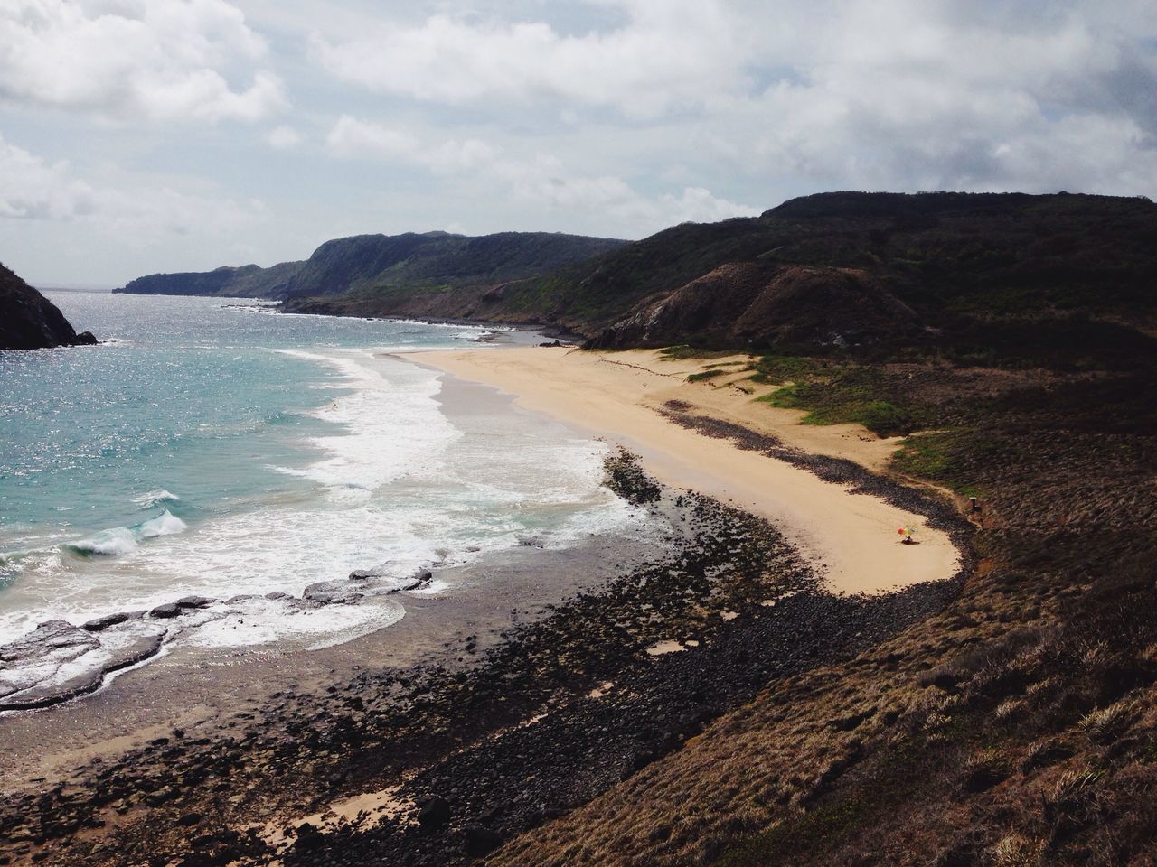 sea, beach, sand, scenics, nature, beauty in nature, water, outdoors, tranquil scene, sky, travel destinations, tranquility, horizon over water, day, wave, cloud - sky, vacations, no people