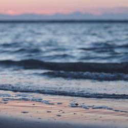 Scenic view of sea at sunset