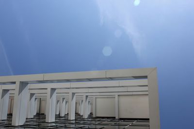 Low angle view of built structure against blue sky