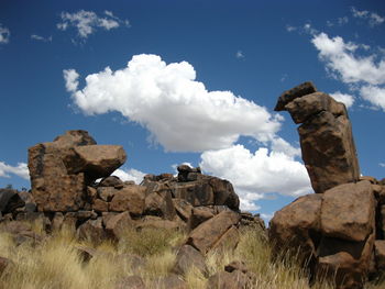 Panoramic view of rock formations against sky