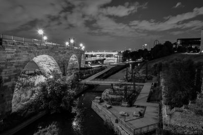 High angle view of bridge over river in city against sky