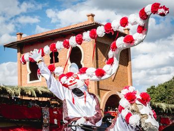 Low angle view of red lanterns hanging on building