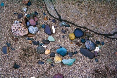 High angle view of pebbles on beach