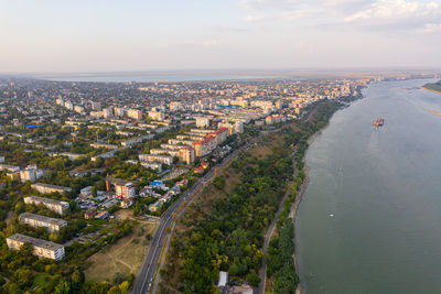High angle view of city buildings against sky