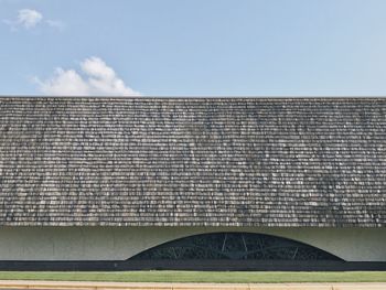 Brick wall against sky