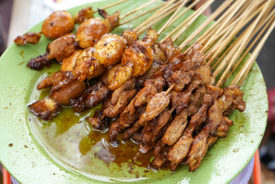 Sate or satay or sometimes satai is food made from pieces of meat chicken, goats, cows, pigs, fish. 