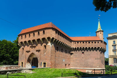 Historic building against clear blue sky