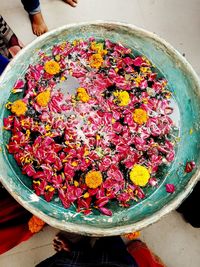 High angle view of various flowers in bowl on table