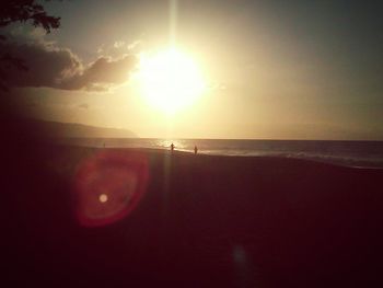 Scenic view of sea at sunset