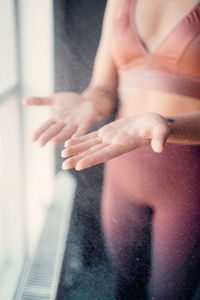 Close-up of hands against blurred background