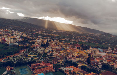 High angle view of townscape against sky in city