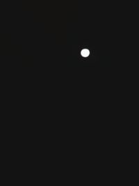 Scenic view of moon against sky at night