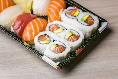 Close-up of sushi served on table