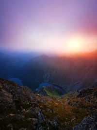 Cloudy mountain peaks at sunrise. tatry poland, rysy on the right.