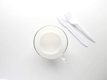 High angle view of tea on table against white background