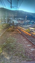 Railroad tracks against clear sky