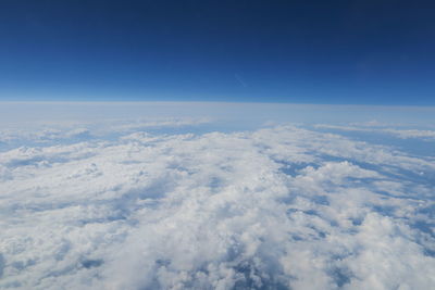 Aerial view of cloudscape against blue sky