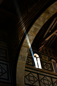 Low angle view of illuminated ceiling in building