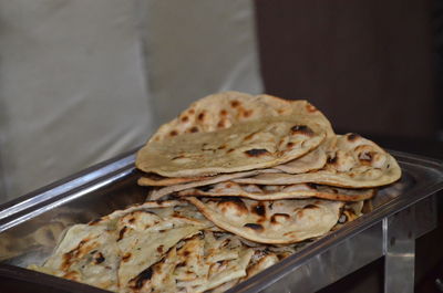 Close-up of breads in container