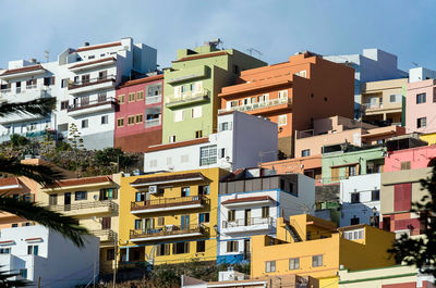 Residential buildings against clear sky