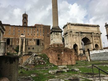 Old ruin building against cloudy sky