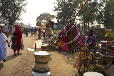 Group of people at street market