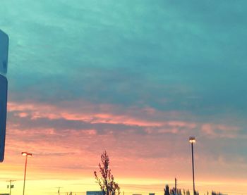 Low angle view of cloudy sky at sunset