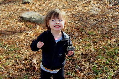 Girl clenching teeth on field