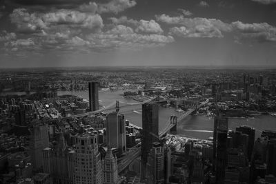 High angle view of buildings in city against sky