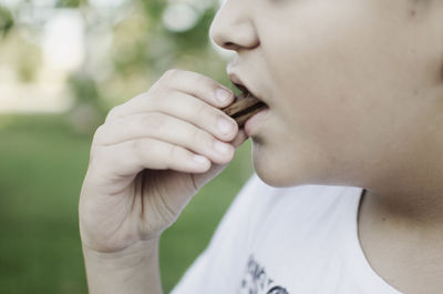 Close-up of man eating ice cream