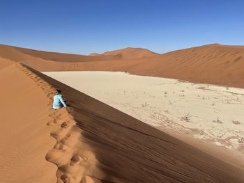 Scenic view of desert against sky