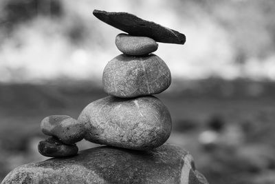 Close-up of stone stack on rock