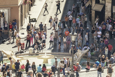 People walking on street in city