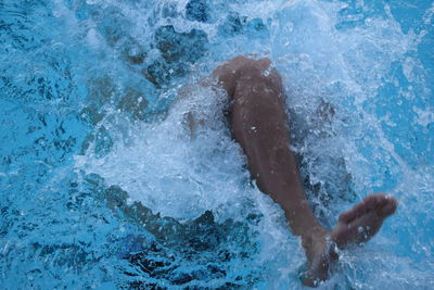 High angle view of man swimming in pool