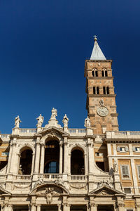 Low angle view of  lateran basilica against blue sky