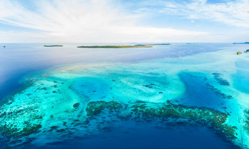 Aerial view of sea against sky