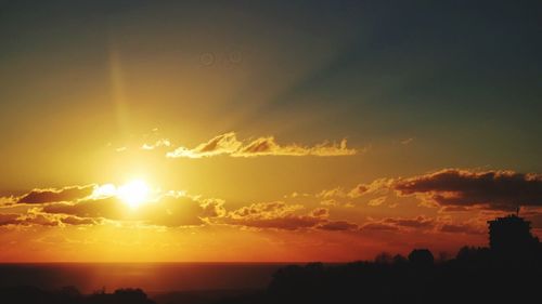 Scenic view of silhouette trees against sky during sunset