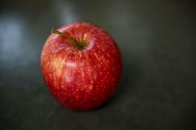 Close-up of apple on black background