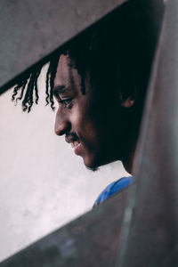 Portrait of young man looking away