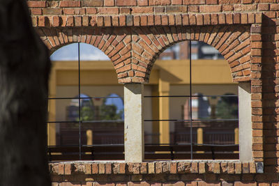 Building seen through arch window