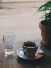 Close-up of coffee cup on table