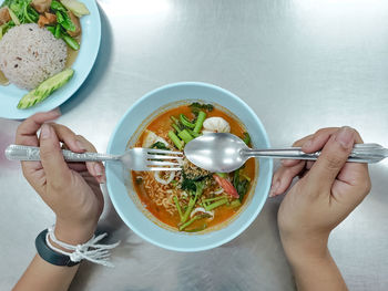 Midsection of man preparing food