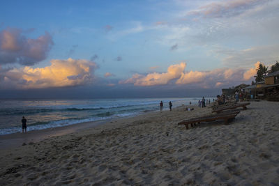 Scenic view of beach against sky during sunset