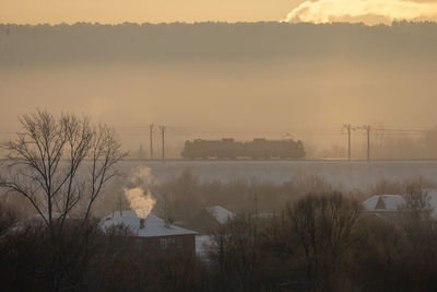 Scenic view of mountains against sky during sunset