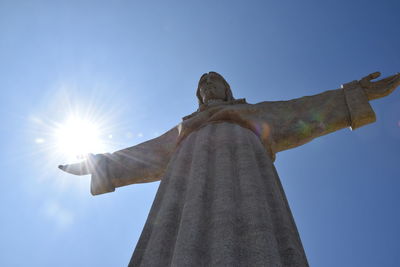Low angle view of statue against sky