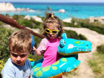 Children playing in sea