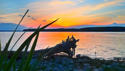 Scenic view of sea against sky during sunset