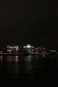 Illuminated cityscape at night