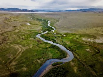High angle view of road amidst landscape against sky