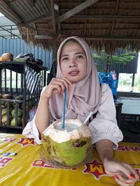 Portrait of a smiling girl holding ice cream